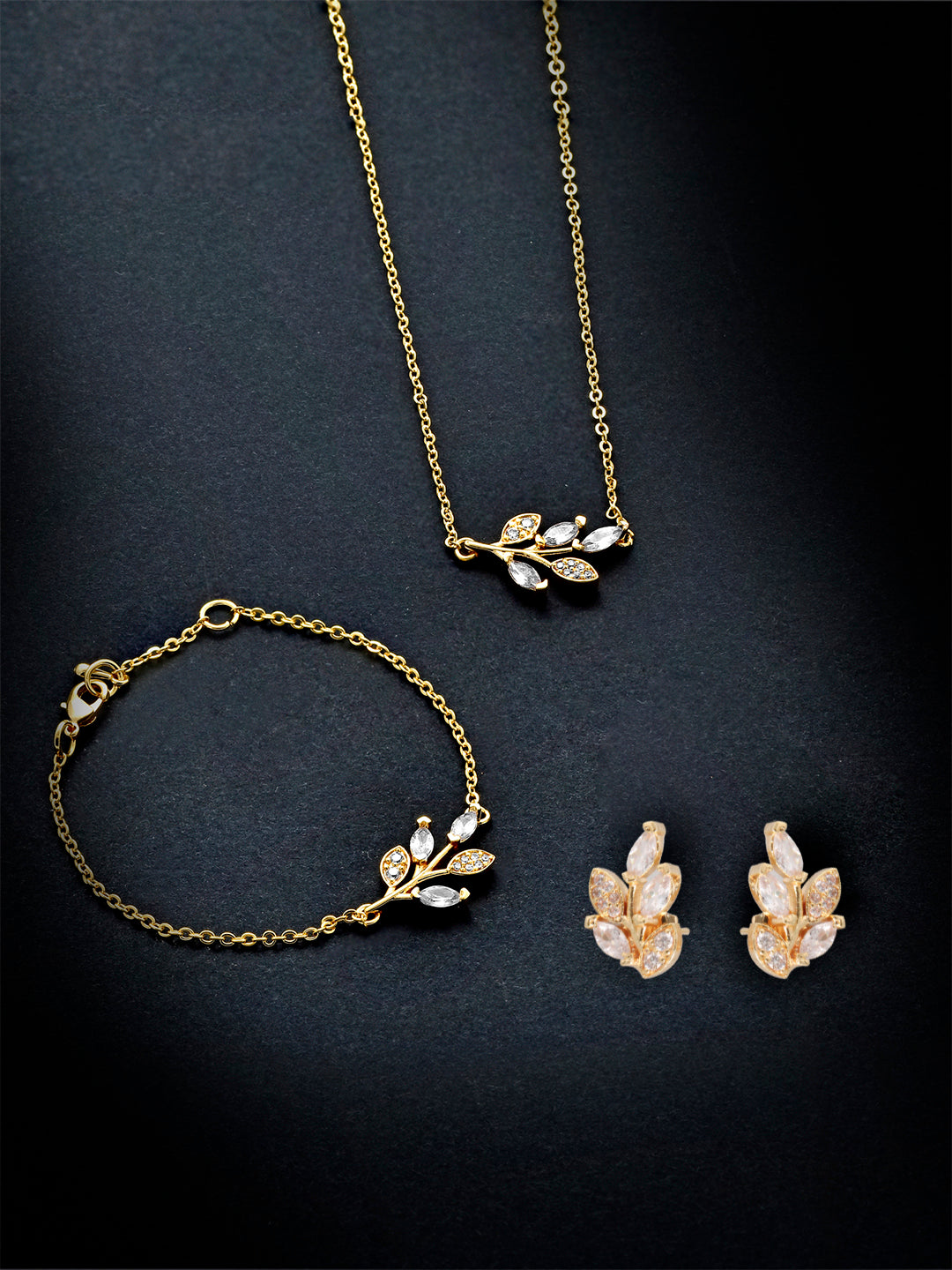 MINUTIAE Gold_Plated White Crystal Studded  pendant bracelets and a pair of earrings Jewellery Set