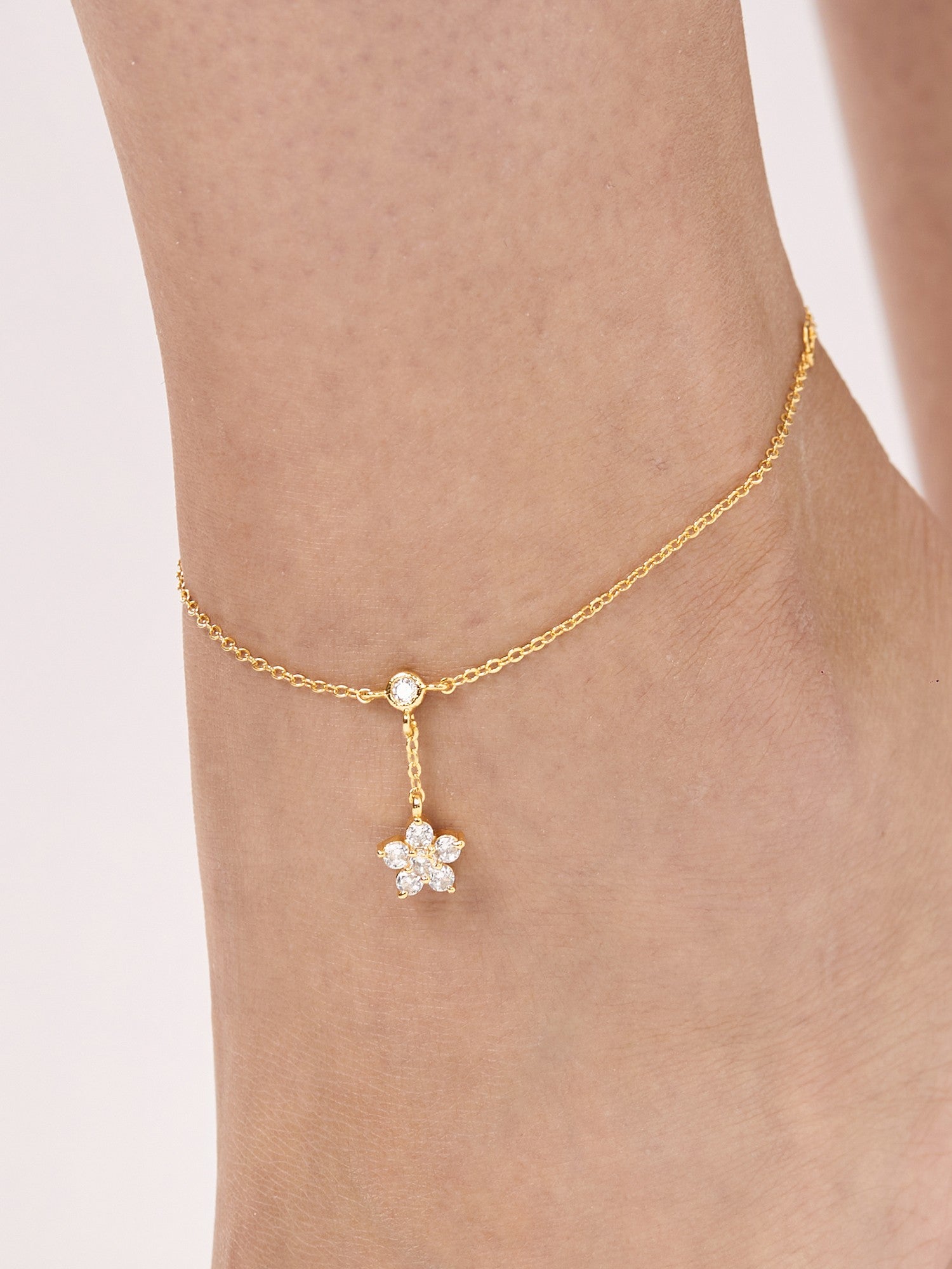 MINUTIAE Gold-Plated White Crystal Studded Handcrafted Nakshatra Anklet For Women's