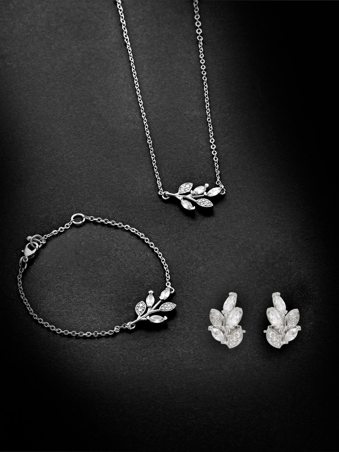 MINUTIAE Gold_Plated White Crystal Studded  pendant bracelets and a pair of earrings Jewellery Set