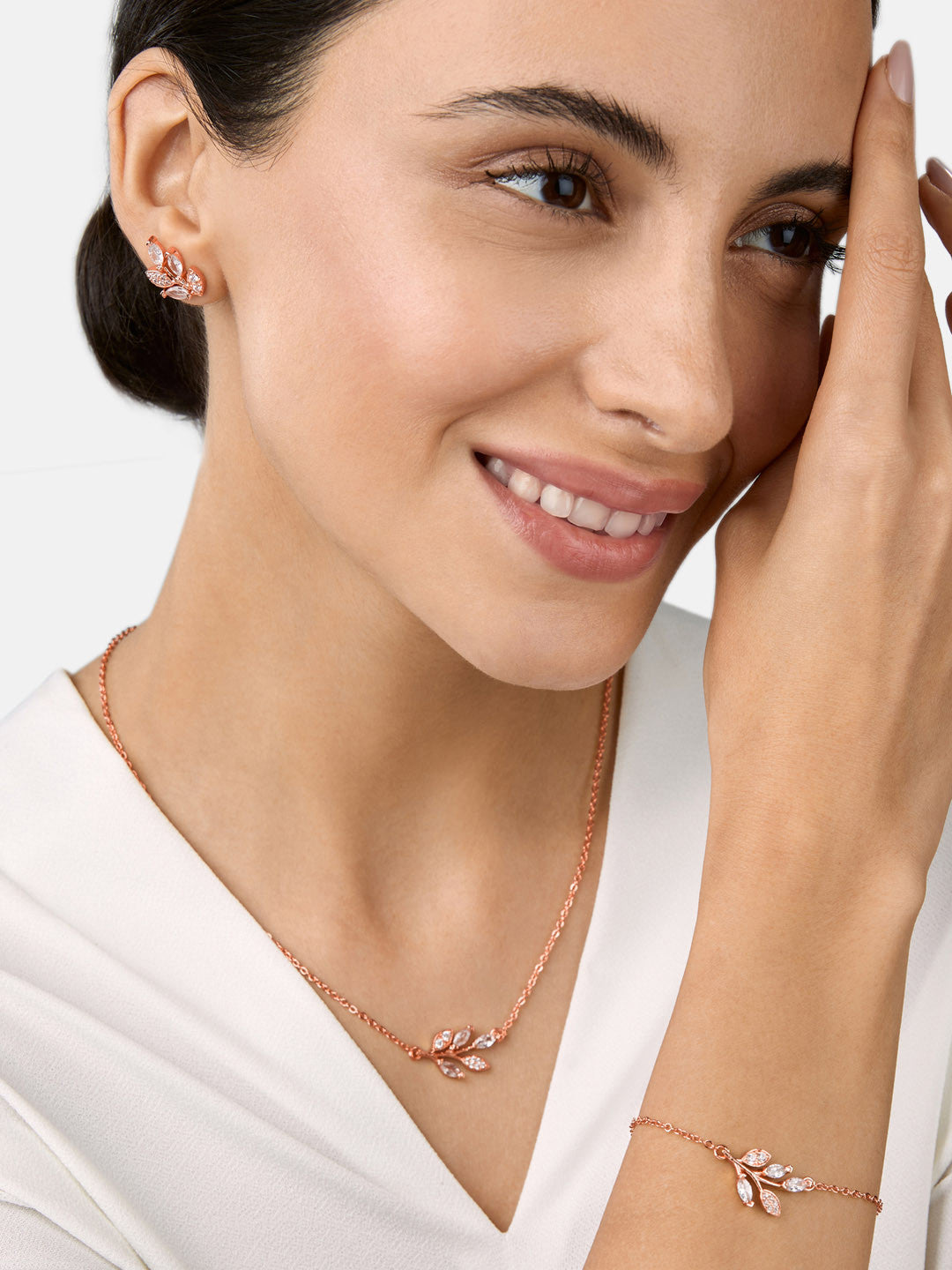 MINUTIAE Gold_Plated White Crystal Studded  pendant bracelets and a pair of earrings Jewellery Set