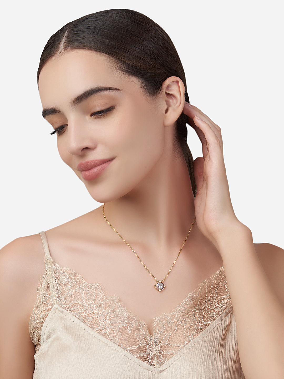 MINUTIAE  Gold_Plated White Crystals Studded pendant and a pair of earrings Jewellery Set