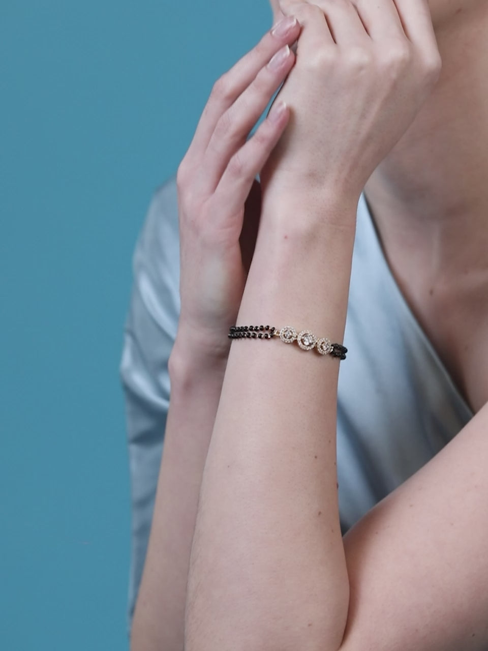 MINUTIAE Gold-Plated Crystals Studded and Beaded Wraparound Mangalsutra Bracelet